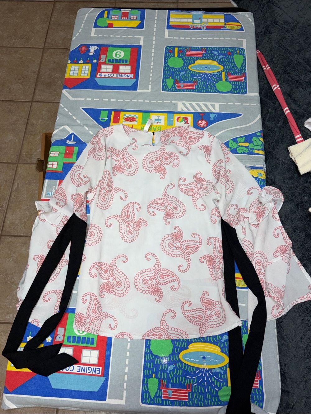 White long sleeve blouse with pink paisley print